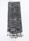 Een handgeweven Leisure Towel, gemaakt van een stevig zijdedoek, met zorgvuldig vakmanschap en een luxueuze uitstraling. Het doek is ontworpen voor ontspanning en biedt zacht comfort en duurzaamheid