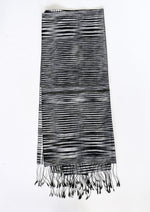 Een handgeweven Leisure Towel, gemaakt van een stevig zijdedoek, met zorgvuldig vakmanschap en een luxueuze uitstraling. Het doek is ontworpen voor ontspanning en biedt zacht comfort en duurzaamheid