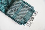Een handgeweven Leisure Towel, gemaakt van een stevig zijdedoek, met zorgvuldig vakmanschap en een luxueuze uitstraling. Het doek is ontworpen voor ontspanning en biedt zacht comfort en duurzaamheid